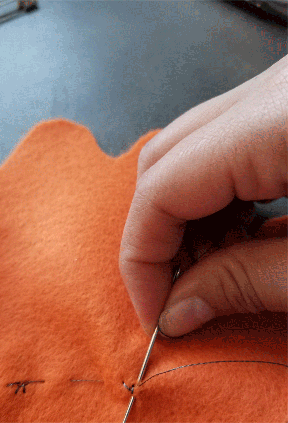 Gif of tying a knot and cutting the end